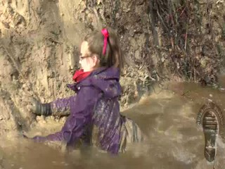 Fun on a muddy slope. Adventure with mud, Vikings & stripy socks