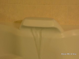 Sharron takes a luxurious bubble bath...