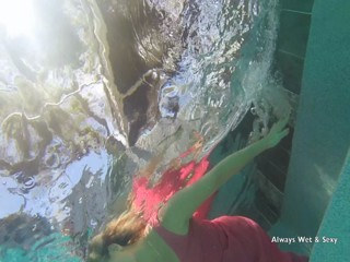 Natalia in Peach Dress going for a swim