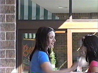 Two girls pie each other