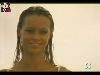 Anna Falchi wading into sea