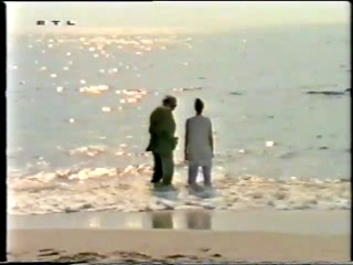 RTL - lady wading wearing white trousers-qt