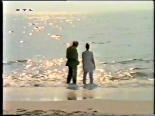 RTL - lady wading wearing white trousers-qt