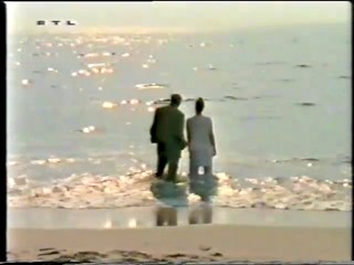 RTL - lady wading wearing white trousers-qt