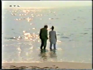 RTL - lady wading wearing white trousers-qt