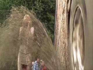 See Spot Run; Leslie Bibb splashed with mud