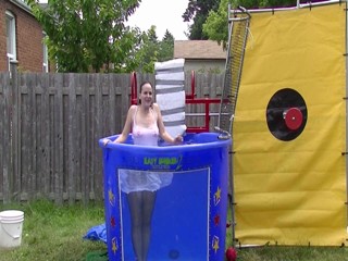 Megan Dunked In a white skirt & top  & pantyhose Preview