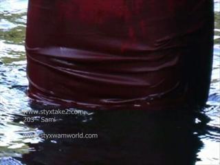 Sami soaks a red dress