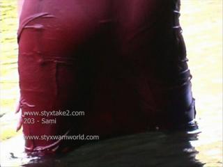 Sami soaks a red dress