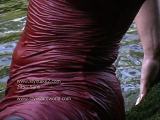 Sami soaks a red dress