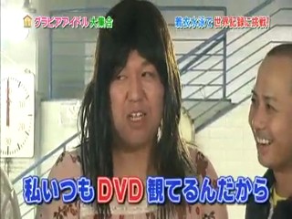 Japanese girl clothed swimmming.