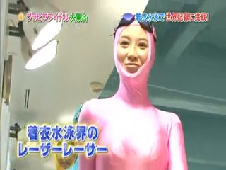 Japanese girl clothed swimmming.