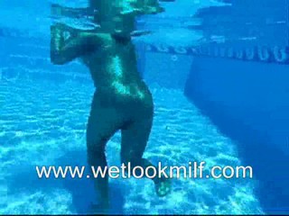 Wetlook Milf swimming in Shiny catsuit