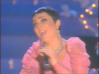 Singer Pours Water On Herself