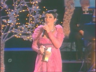 Singer Pours Water On Herself