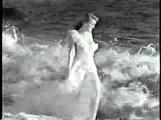 Lets Give 'em Something to Talk About,  Wet dress on the beach