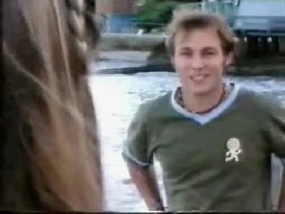 girl jumps from boat in jeans