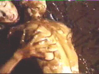 Asian topless mud wrestling