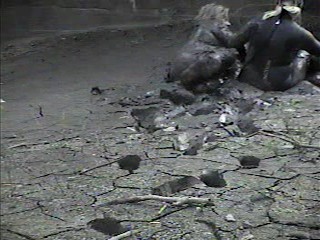 Rubber wetsuits in mud