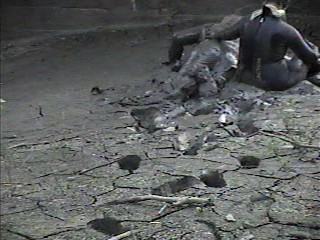 Rubber wetsuits in mud