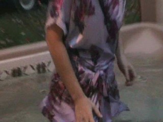 Jennifer in the hottub in her nightgown