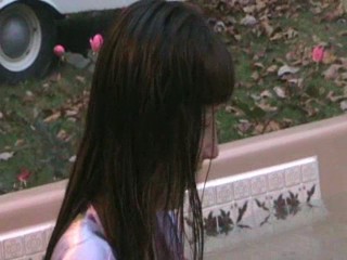 Jennifer in the hottub in her nightgown