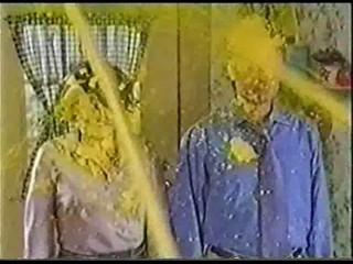A Man & Women get Covered in Yellow Gunge