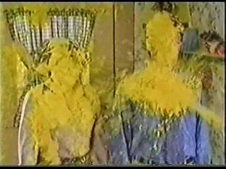 A Man & Women get Covered in Yellow Gunge
