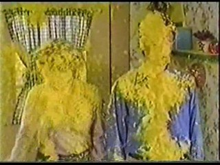 A Man & Women get Covered in Yellow Gunge
