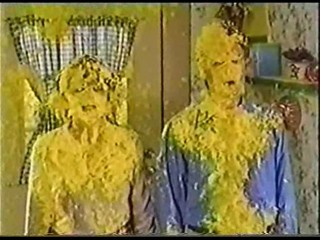 A Man & Women get Covered in Yellow Gunge