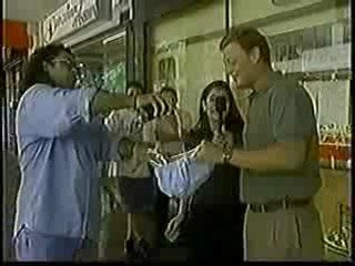 Women gets shaving cream on her head