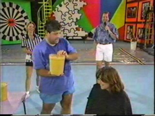 Women gets Cream Corn Poured over her head