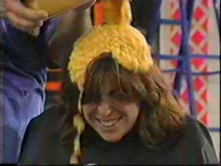 Women gets Cream Corn Poured over her head