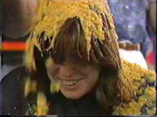 Women gets Cream Corn Poured over her head