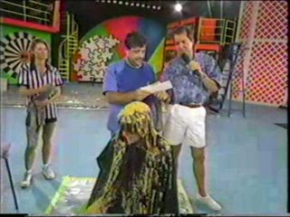 Women gets Cream Corn Poured over her head