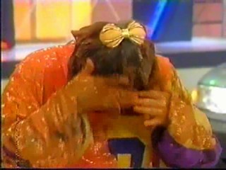 Contestant gets orange slime pour