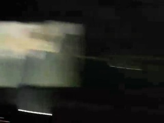 Taylor Swift performing in rain