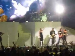 Taylor Swift performing in rain