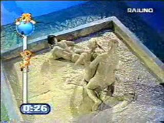 Mud wrestling (2 girls against 1 guy)