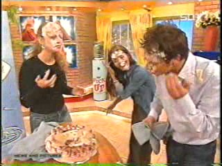 women caked on TV show