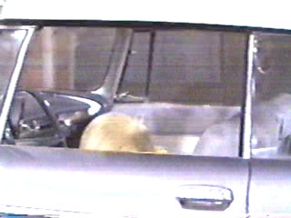 woman goes through car wash