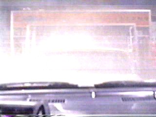 woman goes through car wash