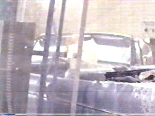 woman goes through car wash