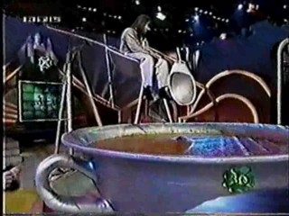 Glucksritter - Germany - Girl in black pants dunked in the slimy soup bowl