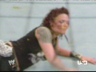 wwe:- Lita sprayed in the face with mustard