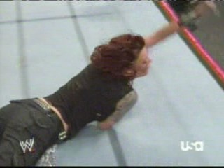 wwe:- Lita sprayed in the face with mustard