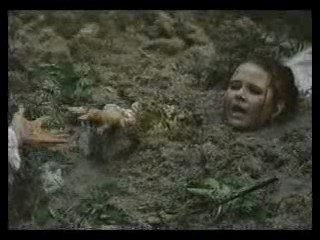 girl in wedding dress in bog