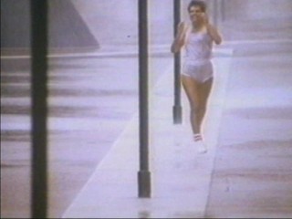 Katerina Witt getting very wet in the rain