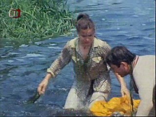 Early 80's  movie with sinking canoe